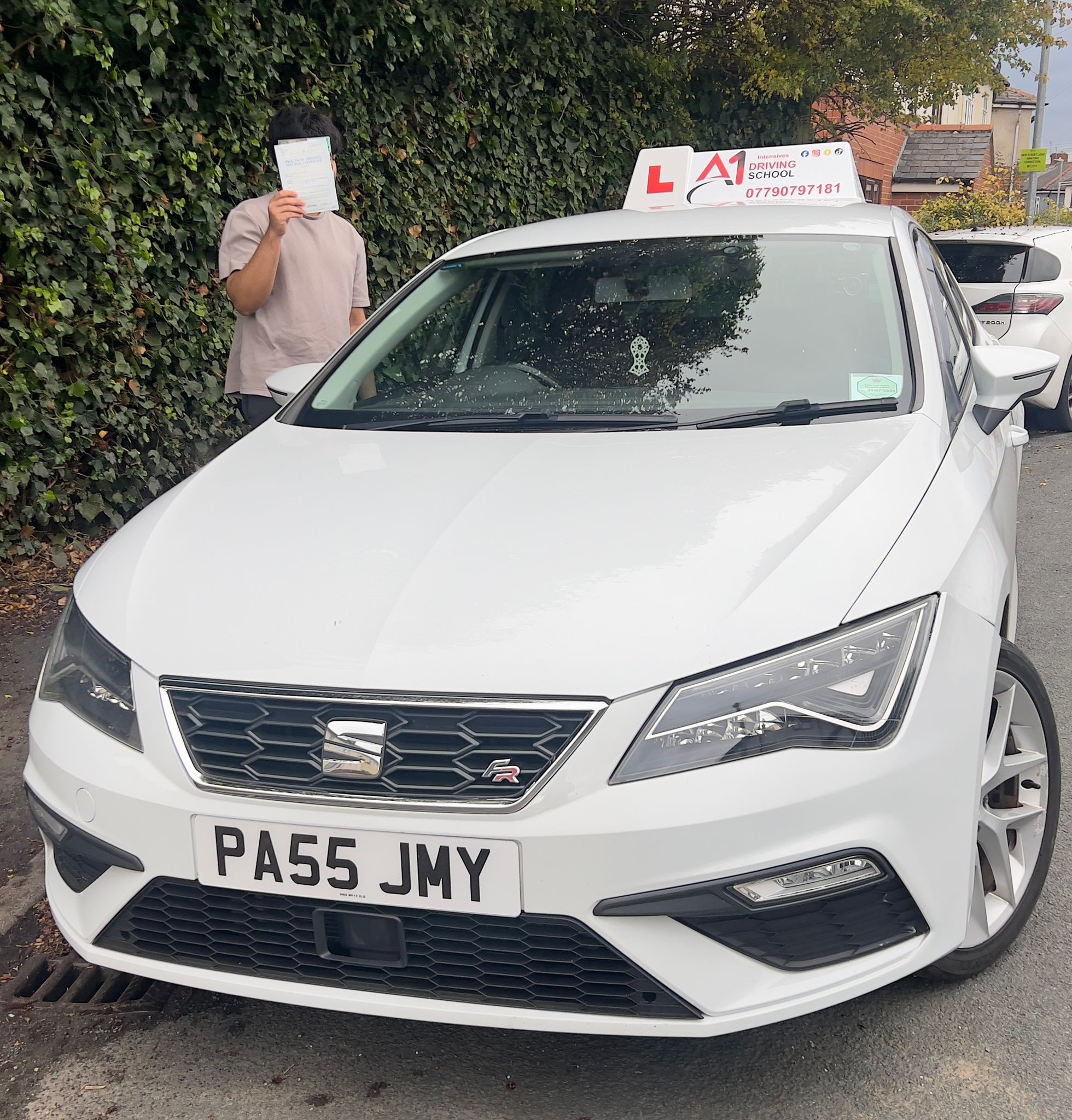 A1 Intensives student celebrating passing their UK driving test (success story 2)